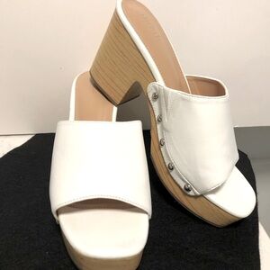 Forever 21 white slides. Size 8. Silver nail head accents. 3.5 in heels. NWOT